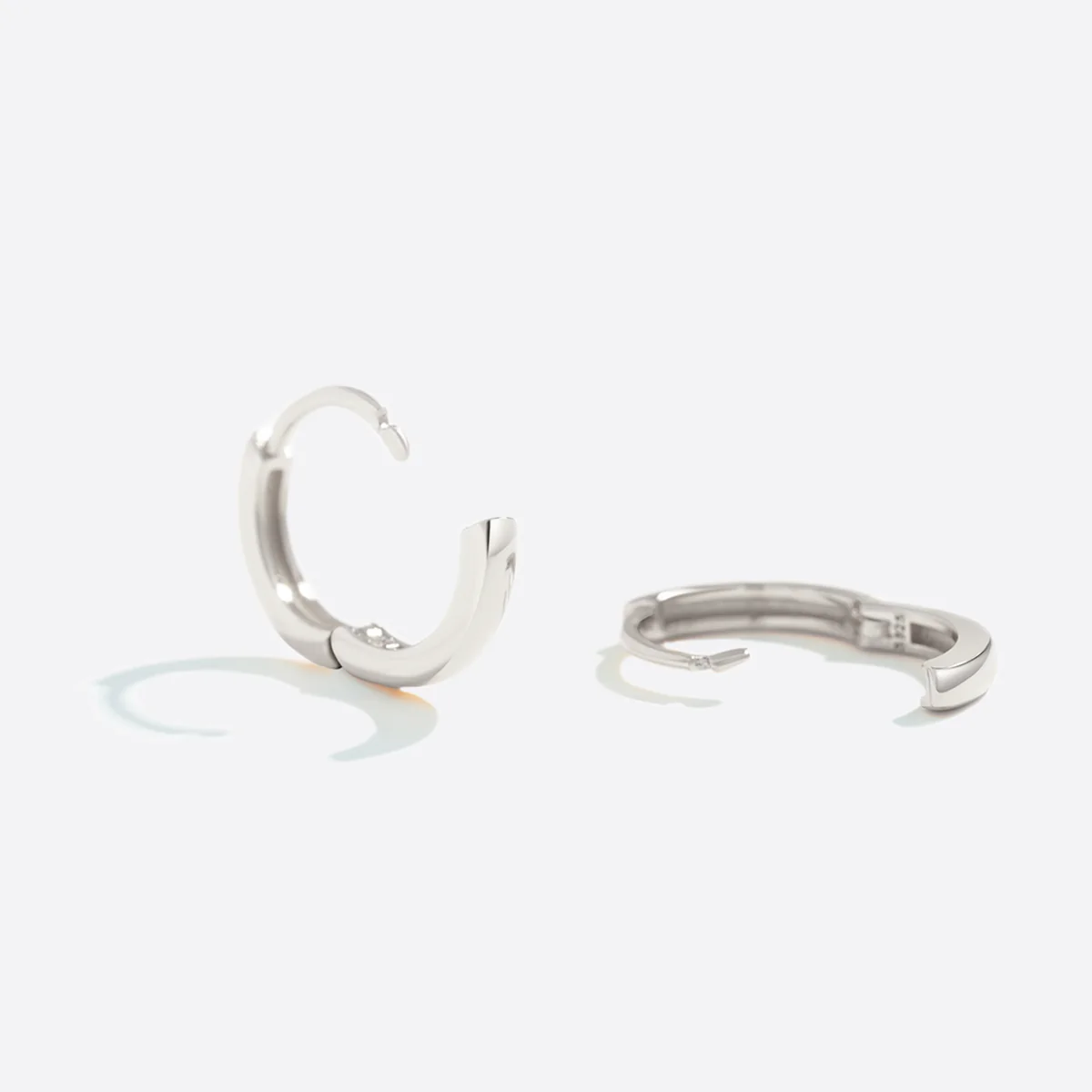 Dainty Huggie Hoop Earrings - Image 11